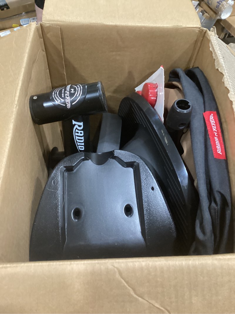 Condition photo showing As Is for radio flyer city 4-in-1 stroll 'n trike, black, for riders 1-5 years old, 4 riding modes, 3 point harness with comfort pad, parent controlled steering, rear storage, stroller tricycle for toddlers