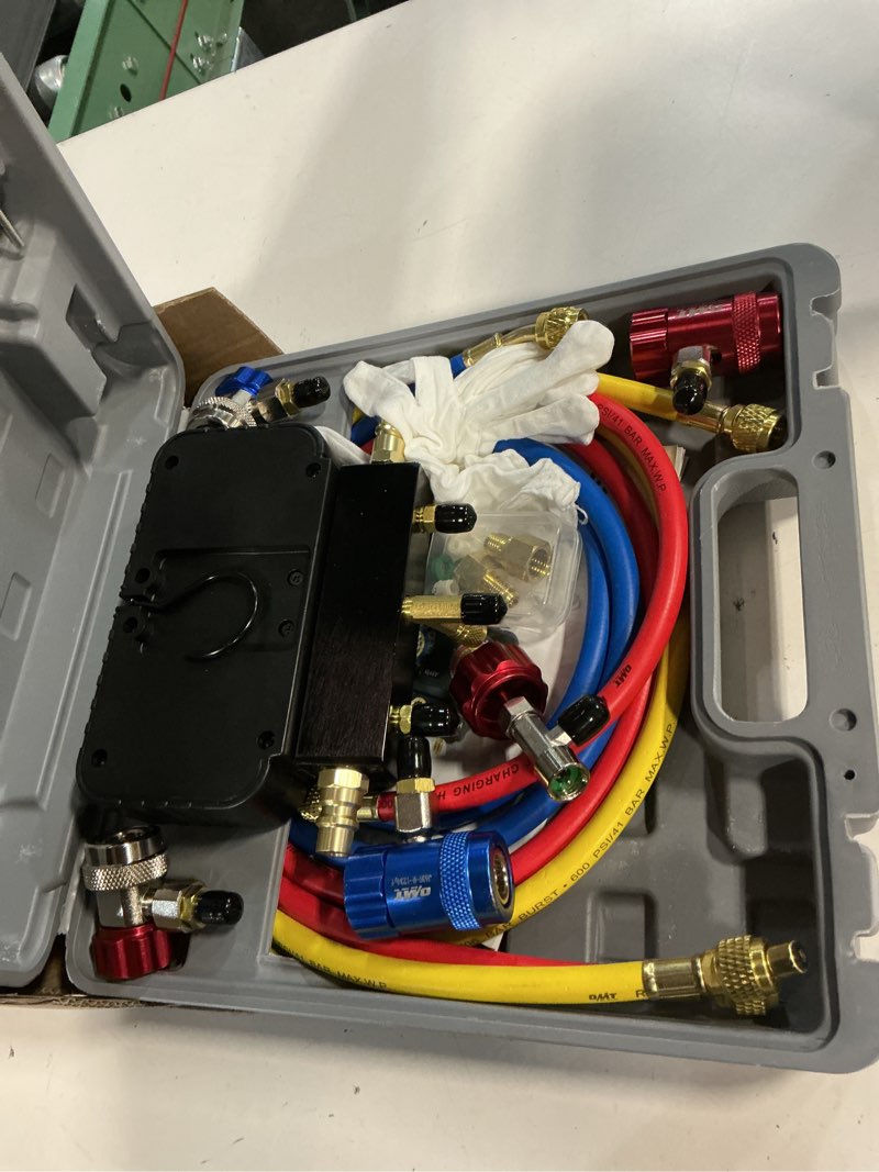 Condition photo showing Good Condition for Orion Motor Tech AC Gauges, 3 Way Manifold Gauge Set for R1234yf R404a R134a Refrigerant, Automotive Gauge Set with Hoses Quick Couplers Self Sealing Can Taps for Car Freon Charging & Evacuation
