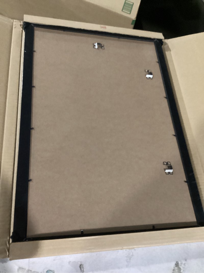 Condition photo showing Good Condition for LaVie Home 16 x 24 Picture Frame Black Poster Frame,Display Pictures 12x18 with Mat or 16x24 Without Mat, Stable and Sturdy Frame and Polished Plexiglass, Suitable for wall decoration?1 Pack? 16x24 Black