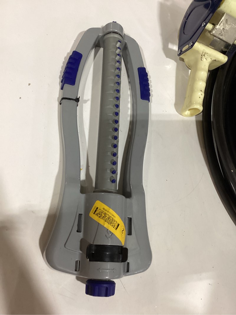 Condition photo showing As Is for orbit orbit max 4000-sq ft oscillating sled lawn sprinkler