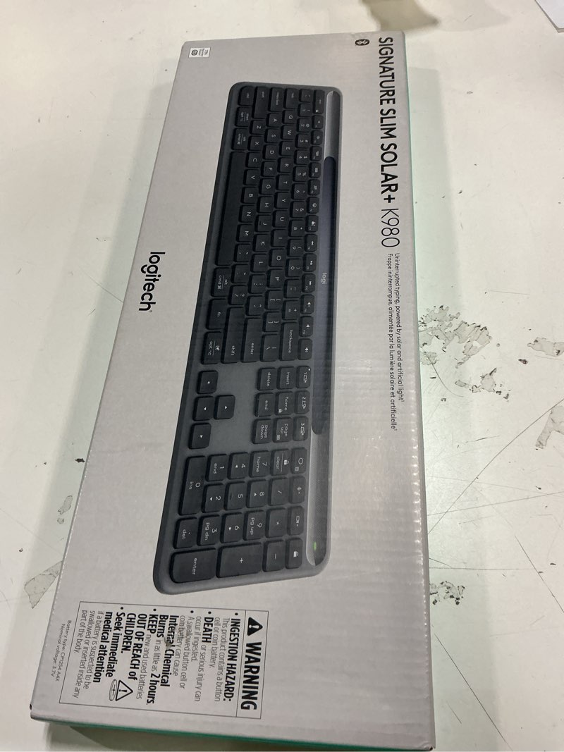 Condition photo showing New/Like New for Logitech Signature Slim Solar+ Wireless Bluetooth Keyboard K980, Solar and Artificial Light Powered, Up to 10 Years Battery Life, Customizable Keys - Graphite Graphite Light Powered Keyboard