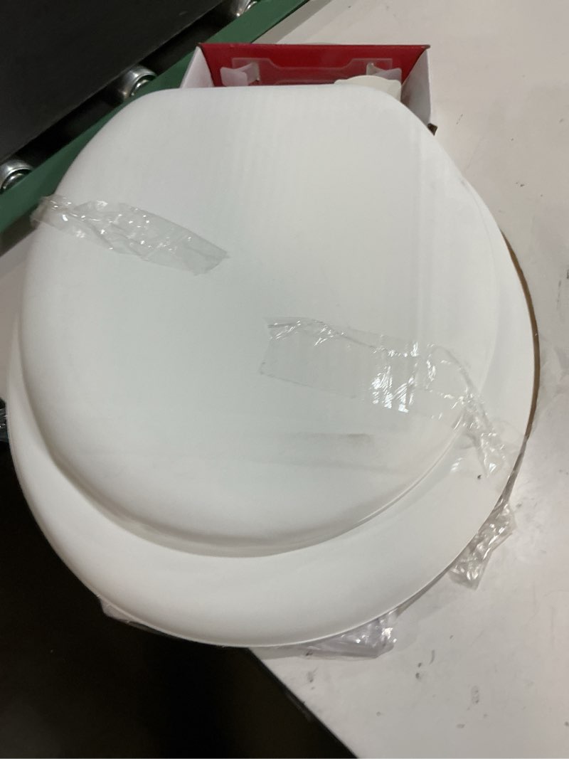 Condition photo showing As Is for premium-mainstays-17" molded soft toilet seat with flip slider qr&sl hinges (tpu leather)