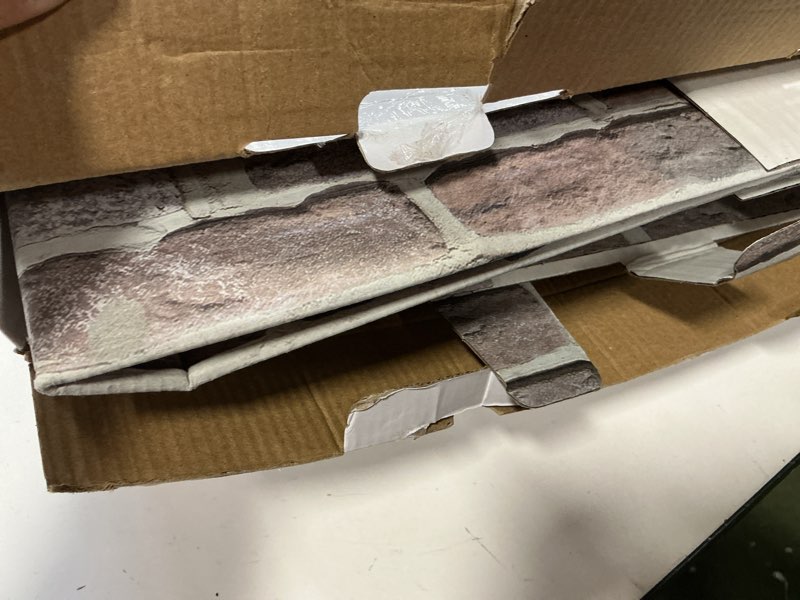 Condition photo showing As Is for Christmas Cardboard Fireplace Prop 3D Artificial White Brick Rustic Fake Fireplace for Christmas Party Background Decor Faux Mantel Backdrop for Farmhouse Xmas Decoration 27 x 12 x 3.5in