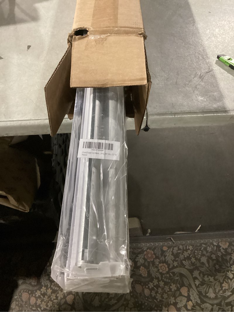 Condition photo showing Good Condition for ChrisDowa Cordless 100% Blackout Roller Shade, with Striped Jacquard, Thermal Insulated, UV Protection Fabric, Total Blackout Blinds for Window, French Doors, Home and Office. White, 45" W x 72" H 45"W x 72"H White