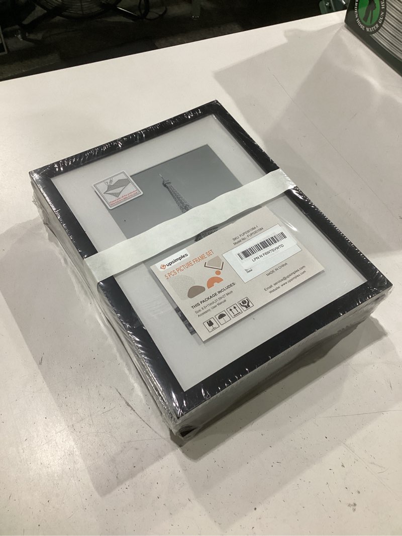 Condition photo showing Good Condition for upsimples 8.5x11 picture frame set of 5, display pictures 6x8 with mat or 8.5 by 11 without, wall gallery photo frames, black black 8.5x11