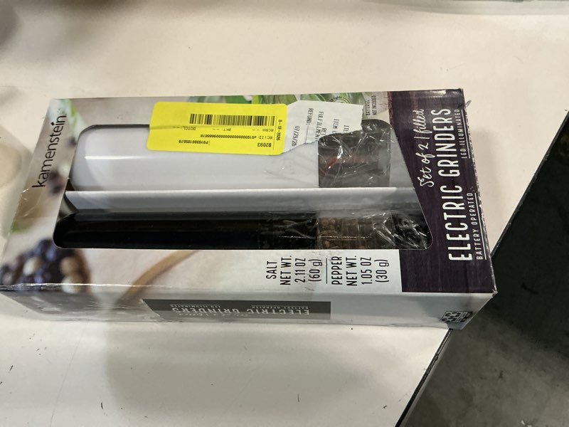 Condition photo showing As Is for kamenstein 8-inch battery operated prefilled salt & pepper grinder set, black & white