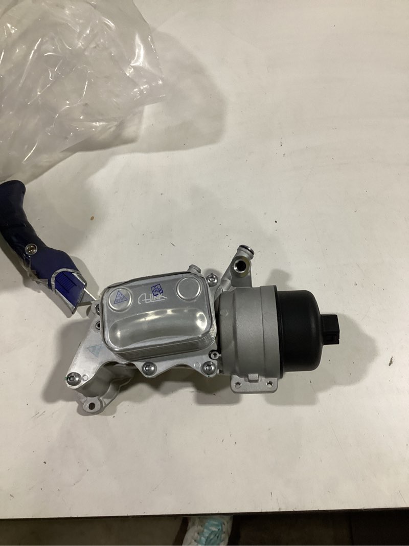 Condition photo showing As Is for vemo oil filter housing
