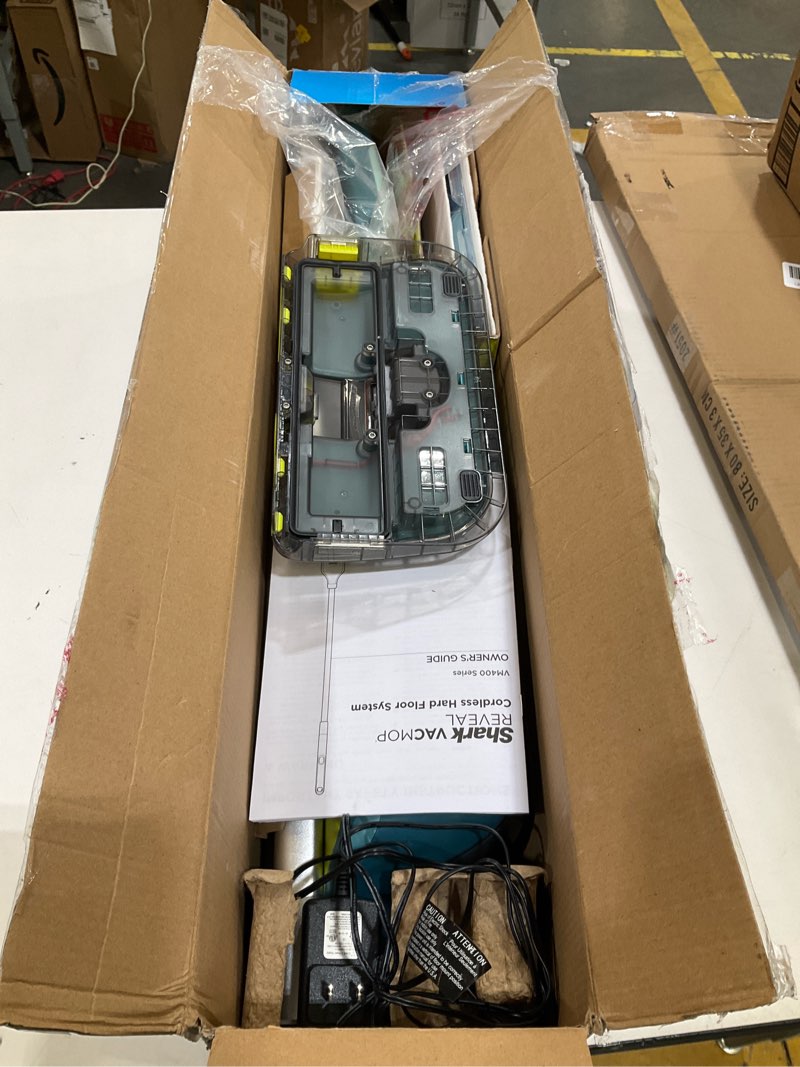 Condition photo showing Good Condition for shark vacmop reveal new cordless hard floor cleaner, vacuum & spray mop, powerful suction, lightweight, illumination light, includes 4 disposable pads, 12oz pet multi-surface cleaning solution, vm401