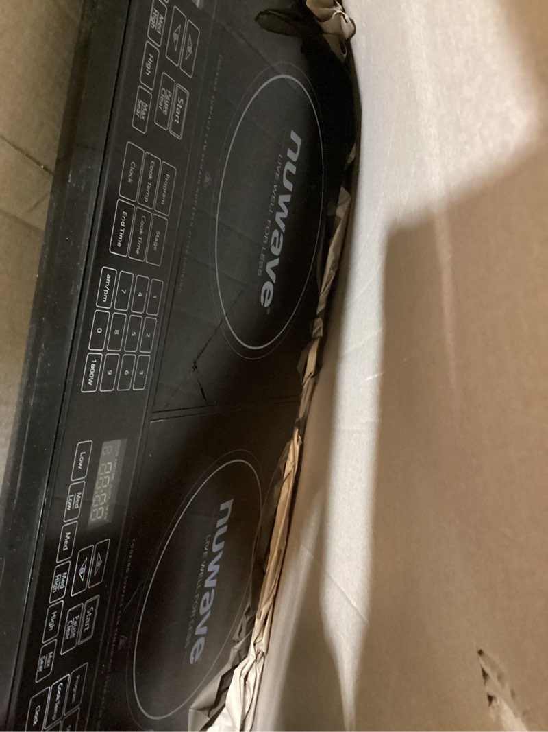 Condition photo showing As Is for nuwave double cooktop induction countertop burner, portable, 900 & 1800w, 100°f to 575°f, large 8” heating coil, 50 pre-programmed settings, shatter-proof ceramic glass, built-in safety auto shut off