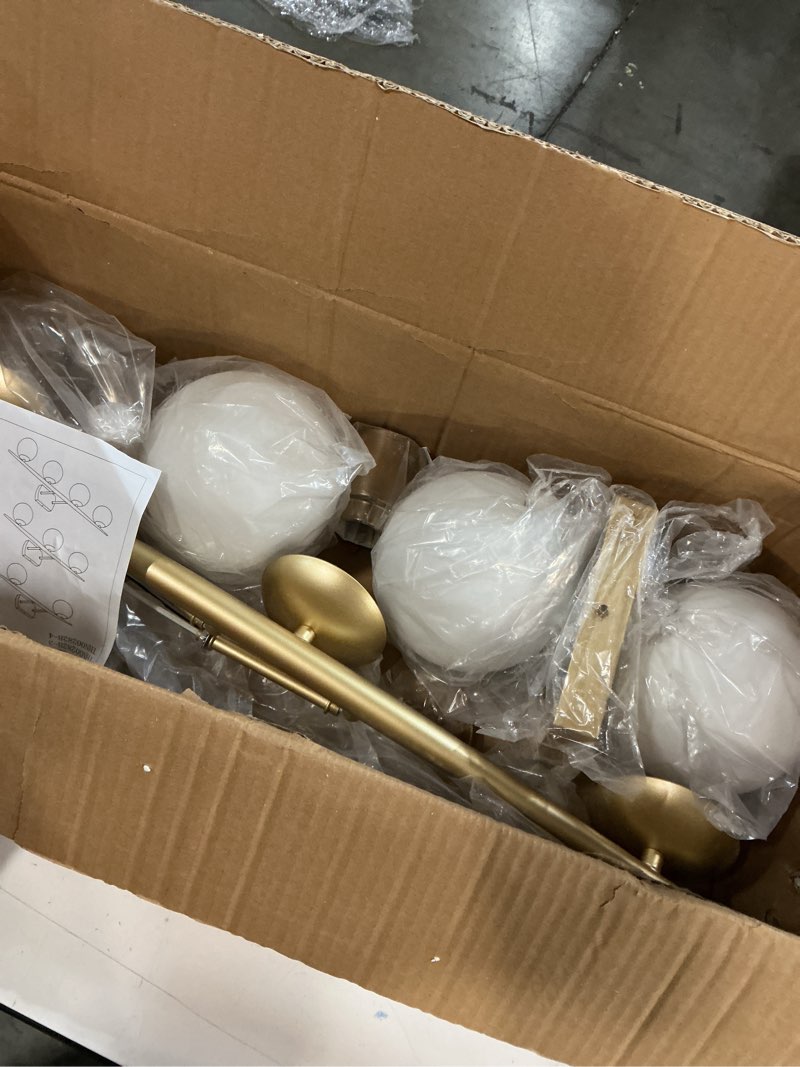 Condition photo showing Good Condition for Gold Bathroom Light Fixtures, 3-Light 25.1 Inch Modern Light Fixture Bathroom with Milky White Frosted Glass Shades, Wall Sconces for Bathroom, Bedroom, Living Room(G9 Bulb not Included) Gold 3-Light