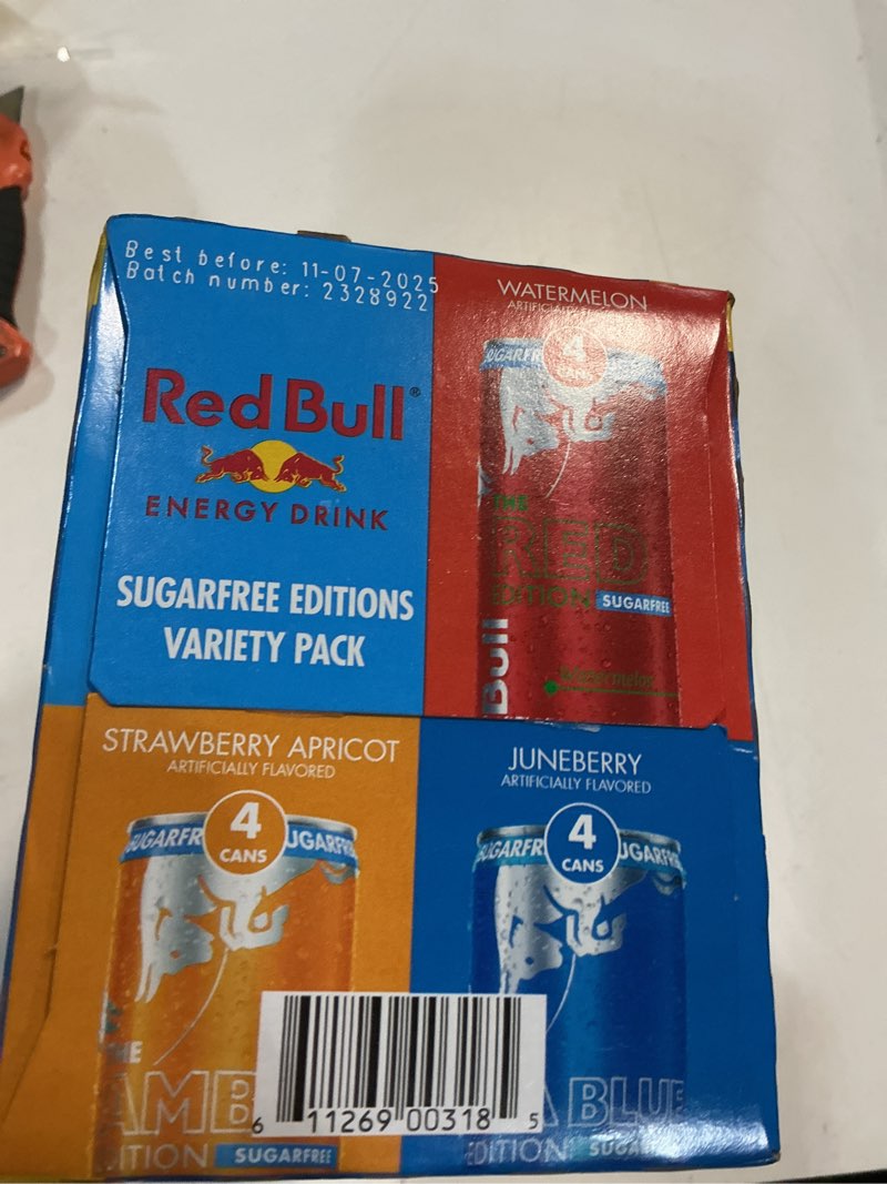 Condition photo showing item condition for Red Bull Sugar-Free Energy Drink Variety Pack, Energy Drink, Red, Amber, & Sea Blue with 80mg Caffeine plus Taurine & B Vitamins, 8.4 Fl Oz, Pack of 12 Cans ( BB 11/07/2025)