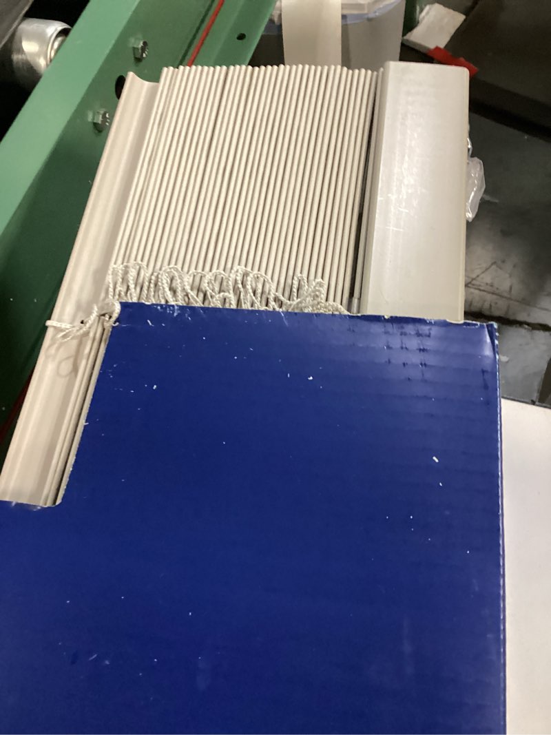 Condition photo showing As Is for LEVOLOR Trim+Go 2-in Slat Width 57-in x 64-in Cordless Greige Faux