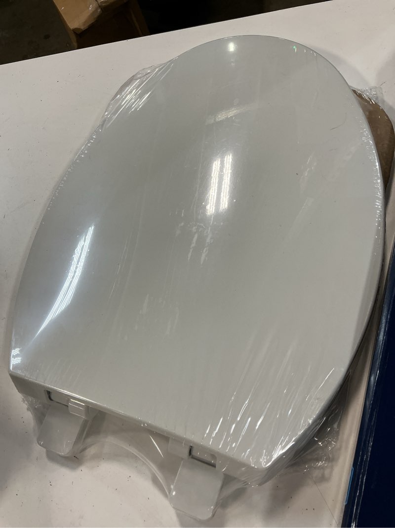 Condition photo showing New/Like New for project source plastic white elongated soft close toilet seat