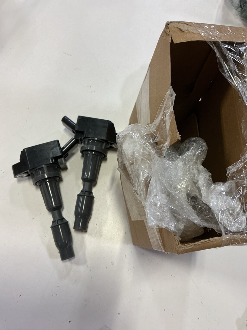 Condition photo showing As Is for (incomplete)uf764 ignition coil pack 27300-2gga0 and iridium spark plug 93175 set of 4 fit for hyundai sonata tu