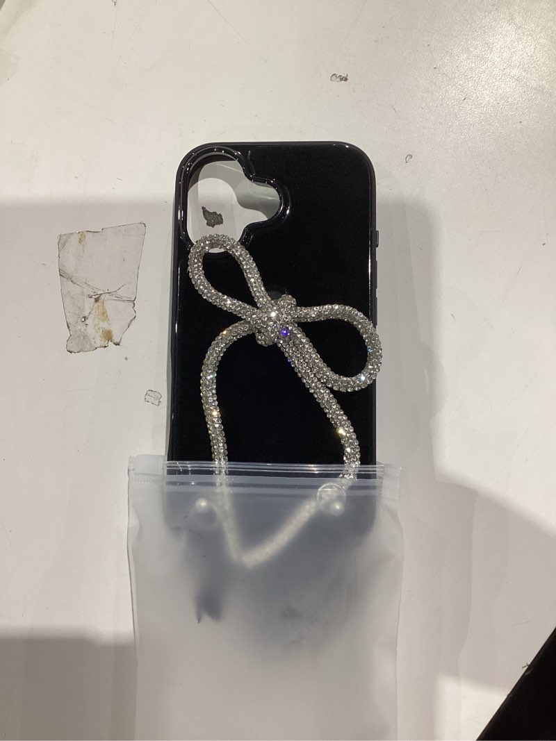 Condition photo showing item condition for crossbody case for iphone 17 - black with stylish silver detachable chain - big bow iphone 17 big bow