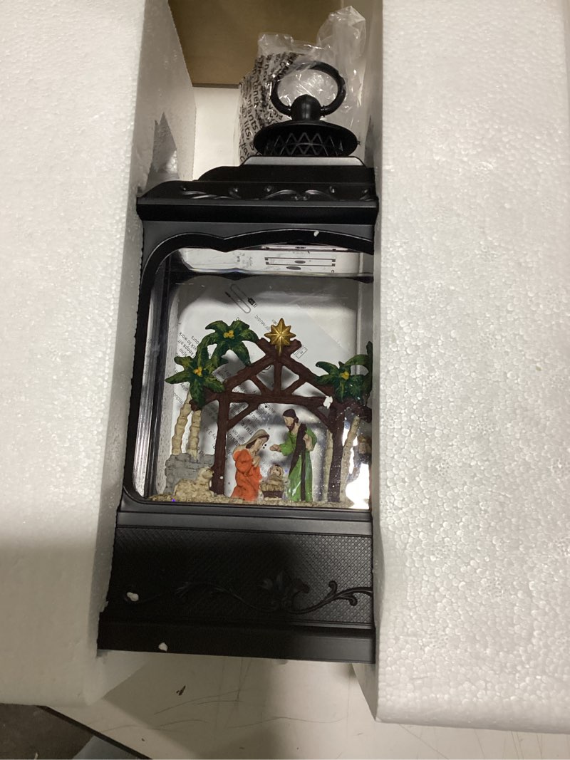Condition photo showing Good Condition for Eldnacele Musical Snow Globe Lantern with Timer, Lighted USB/Battery Operated Swirling Singing Water Glittering Lantern, Snow Globes for Adults and Kids Christmas Decoration- Nativity 2-nativity Black