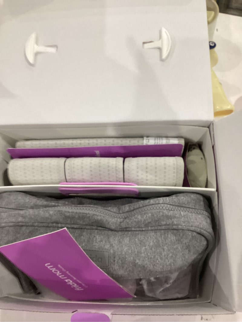 Condition photo showing Good Condition for frida mom c-section recovery must have kit for labor, delivery, & postpartum, socks, peri bottle, disposable underwear, abdominal support binder, shower wipes, silicone scar patches, & toiletry bag c-section recovery kit