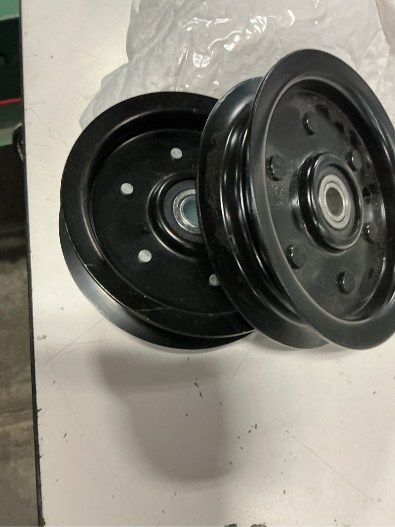 Condition photo showing New/Like New for 605512 idler pulley with 604219 pulley for hustler raptor 52 deck | replaces 603986, 126123 for hustler 52" 48" 36", hustler raptor 52" 42" 36", raptor sd 48" 42" 36", raptor limited 52" decks a40 1x605512+1x604219
