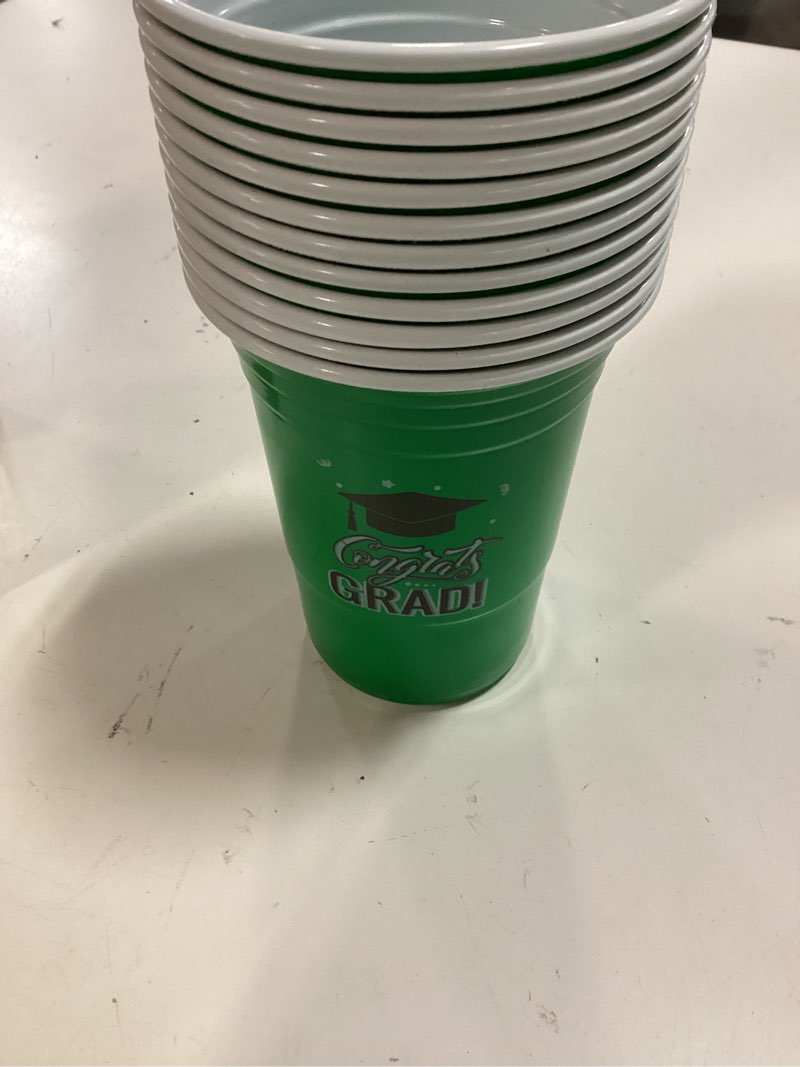 Condition photo showing As Is for ziliny 100 pack graduation decorations 2026 16 oz graduation plastic cups congrats grad disposable drinkware for class of 2026 grad festivities essential graduate party favor supplies (green) 100 green