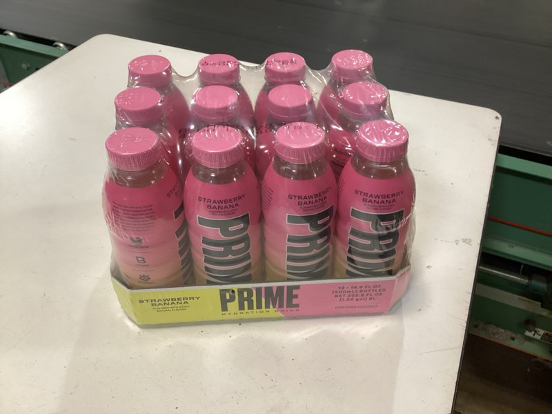 Condition photo showing New/Like New for PRIME Hydration STRAWBERRY BANANA, Sports Drinks, Electrolyte Enhanced for Replenishing Fluids, 250mg BCAAs, B Vitamins, Antioxidants, Low Sugar, 16.9 Fl Oz, 12 Pack