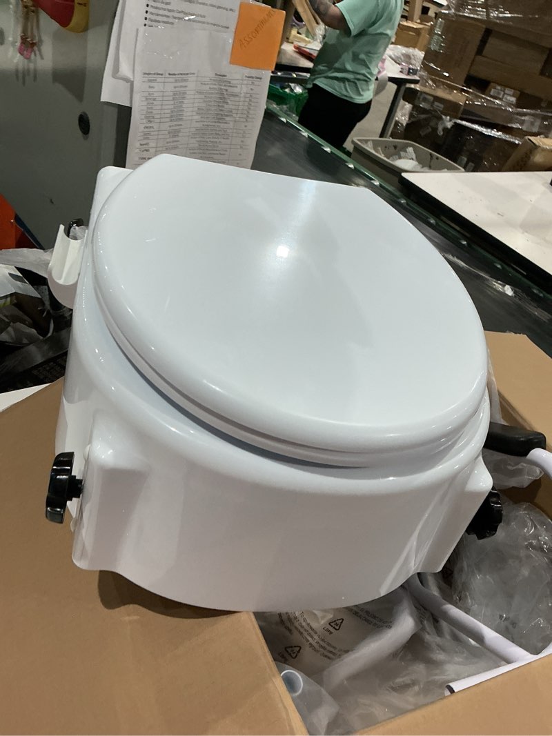 Condition photo showing As Is for laveo dry flush toilet
