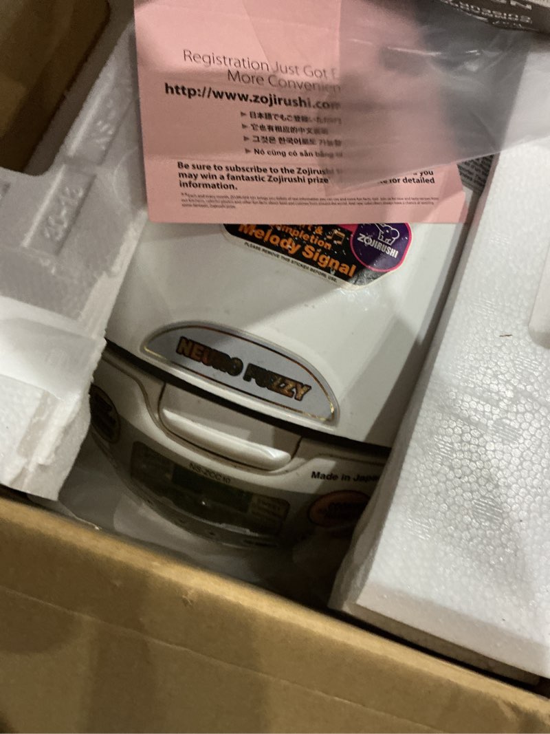 Condition photo showing As Is for zojirushi ns-zcc10 5-1/2-cup neuro fuzzy rice cooker and warmer, premium white 5.5-cup uncooked rice