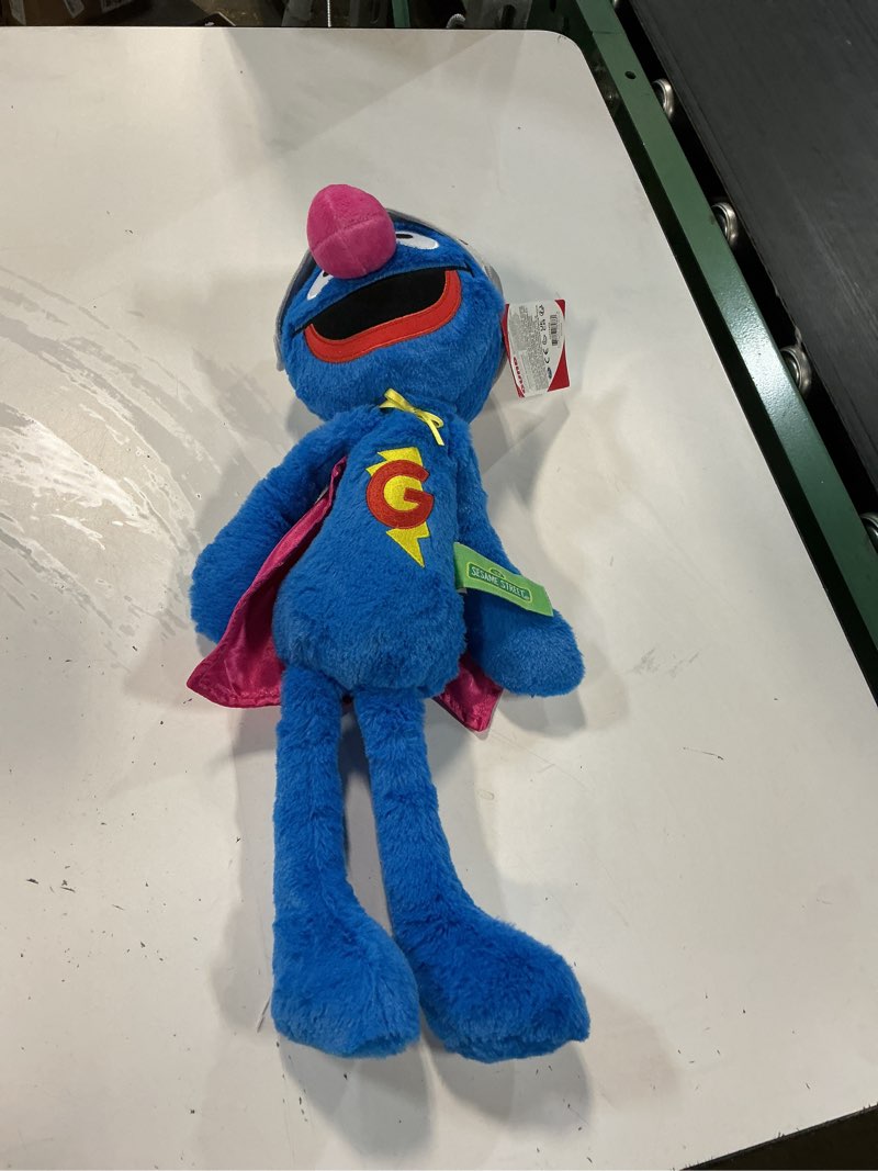 Condition photo showing New/Like New for gund sesame street super grover toothpick 15-inch plush toy, ages 1+ | slender frame and posable limbs promote on the go pretend play; thoughtful gift for readers and students