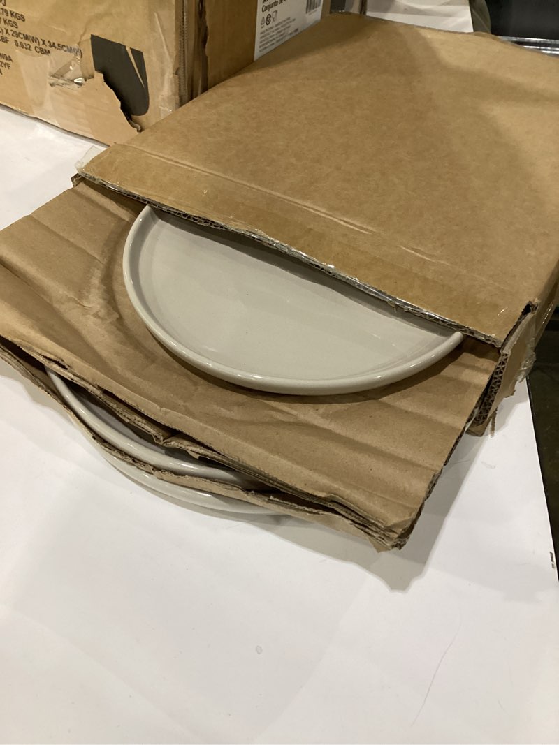 Condition photo showing New/Like New for Amazon Basics Glazed Stoneware Dinnerware, Ceramic 12-Piece Set, 4 Full Place Settings, Dishwasher-Safe, Linen Gray Linen Gray 12-Piece Dinnerware Set, Service for 4