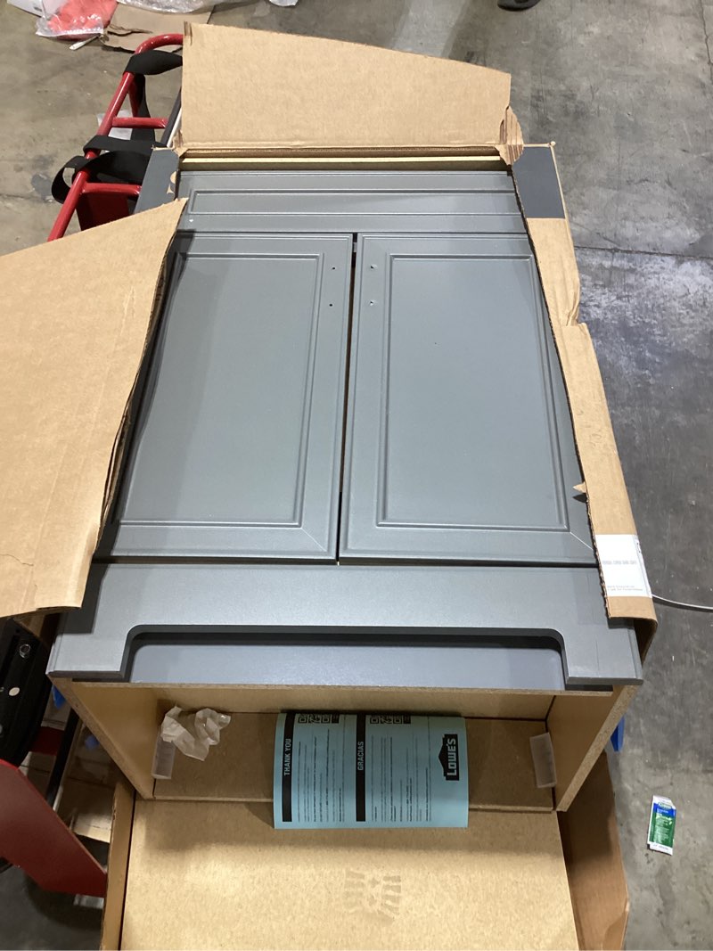 Condition photo showing As Is for 100+ bought last week Style Selections Esterbrook 24-in Dark Gray Single Sink Bathroom Vanity with White Cultured Marble