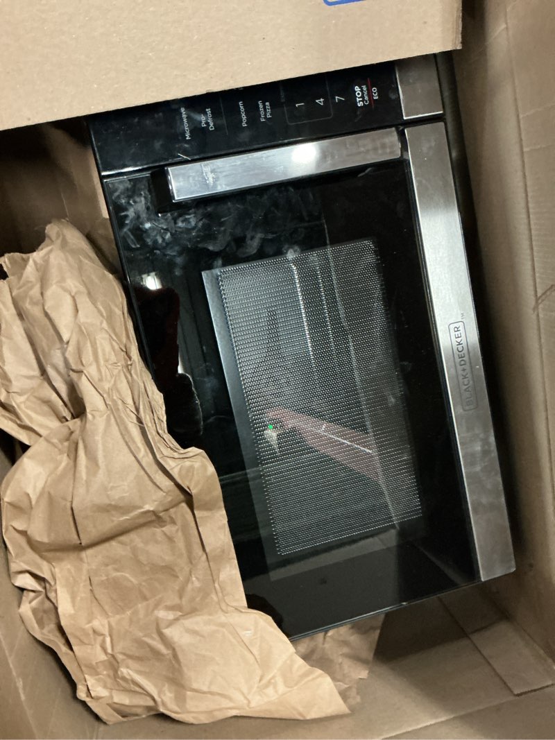 Condition photo showing As Is for black+decker 5-in-1 microwave oven with air fry, combi, bake, roast, and convection cooking, 0.9 cu. ft. countertop microwave, stainless steel, 900 watts, child-lock, es9p032na