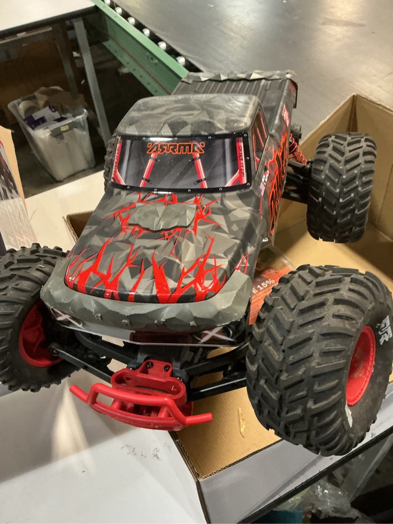 Condition photo showing Good Condition for ARRMA RC Truck 1/10 Quake 223S 2WD RTR (Battery and Charger Not Included) Brushless Monster Truck, Red, ARA3537T1