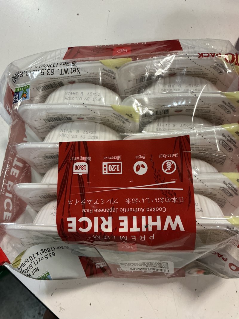 Condition photo showing New/Like New for best by 07/2026 iris instant white rice (10 pack), ultra premium japanese short grain sushi sticky rice, microwave for 80 seconds, non-gmo gluten free vegan, grown polished and packed in japan 10-pack
