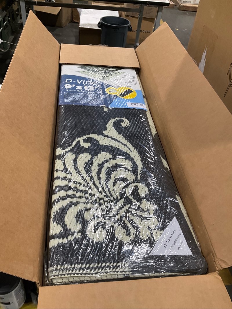 Condition photo showing New/Like New for reversible rv outdoor rug for backyards, beaches, camping grounds, patios, and more, storage bag and mat stakes included, black/beige/d-vine (9x12)