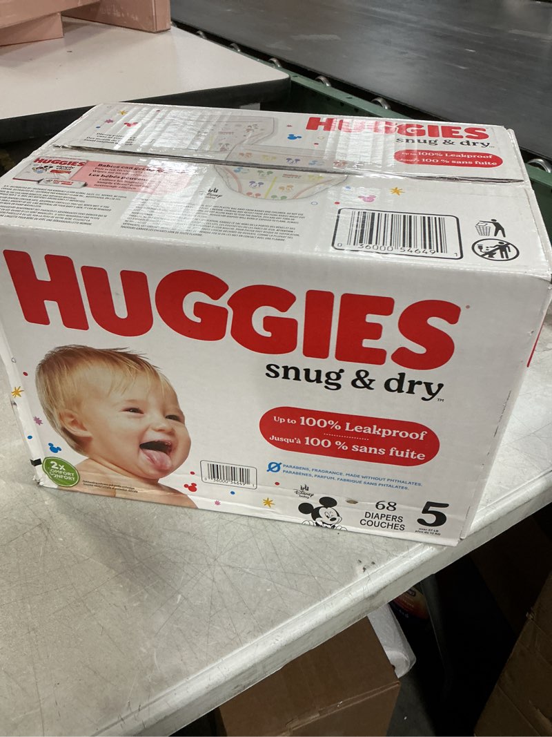 Condition photo showing New/Like New for Huggies Size 5 Diapers, Snug & Dry Baby Diapers, Size 5 (27+ lbs), 68 Count, Packaging May Vary Size 5 68