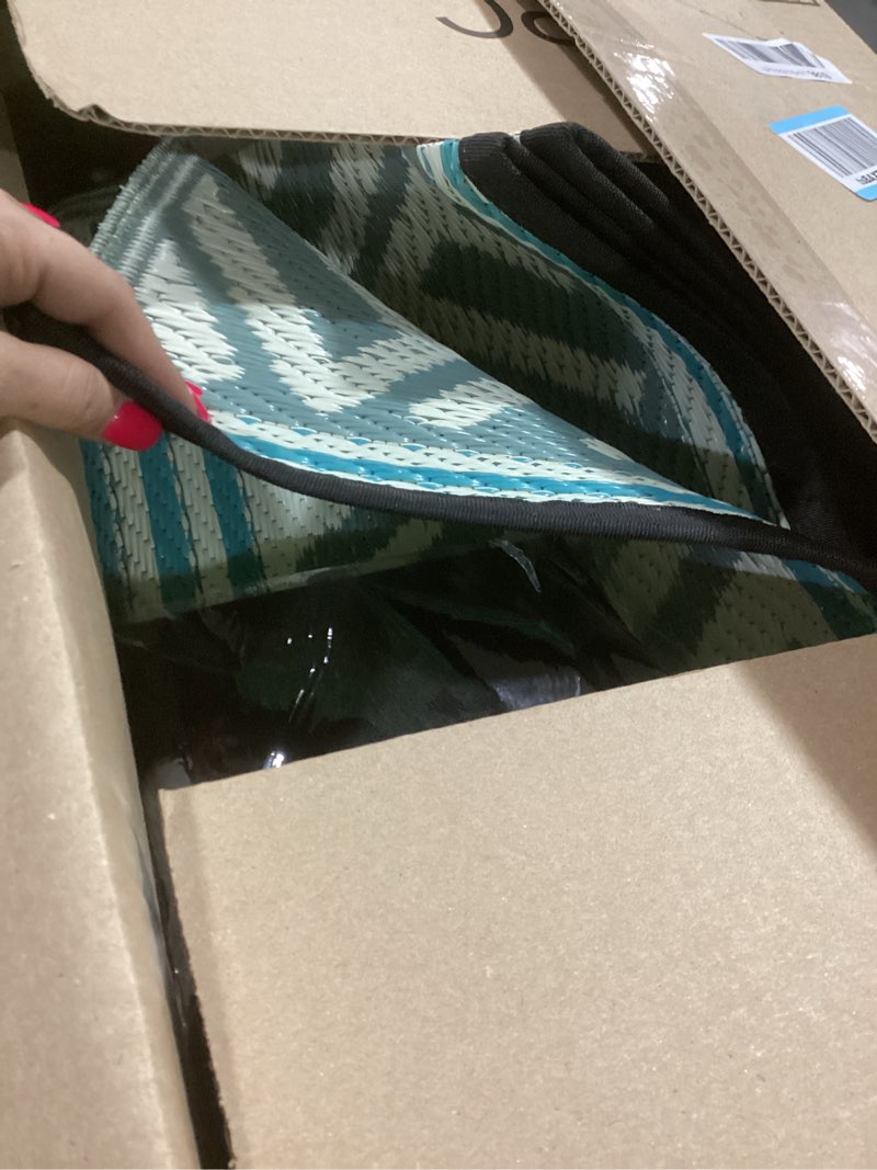 Condition photo showing Good Condition for Outdoor Rugs, Outdoor Plastic Straw Rug, Reversible Waterproof Carpet for Camping, Poolside, Garden, BBQ Area, Gazebo Flooring, RV Park & Beach, Bohemian Style, 9x12 Wavy Line - Blue & Grey 9' x 12'