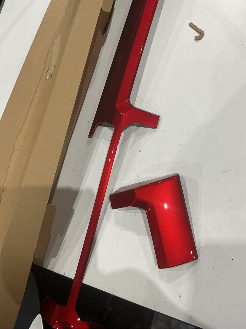 Condition photo showing As Is for gloss red aftermarket interior dashboard trim kit (specifically the dashboard radio surround and the glove box upper trim strip) manufactured for the 2016–2024 nissan titan pickup truc
