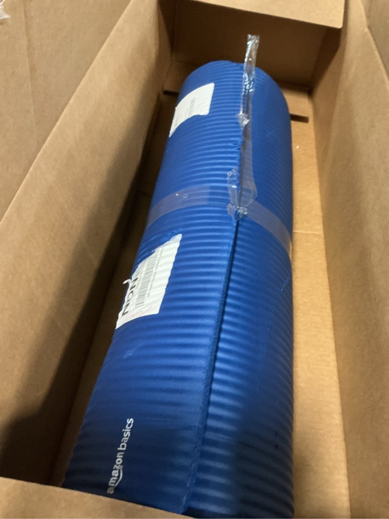 Condition photo showing As Is for Amazon Basics Extra Thick Exercise Yoga Mat with Carrying Strap Blue 1/2 Inch
