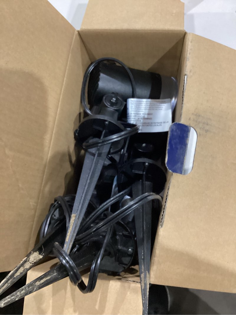 Condition photo showing As Is for harbor breeze spot light 400 -lumens 6.8 -watt black low voltage bright white hardwired led flood light