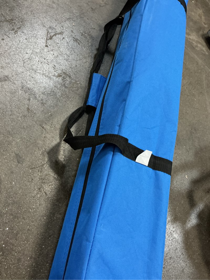 Condition photo showing As Is for ozark trail 10' x 10' instant slant leg pop-up outdoor canopy, blue (demagned )