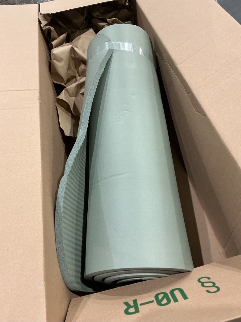 Condition photo showing As Is for this is a green nbr foam yoga mat