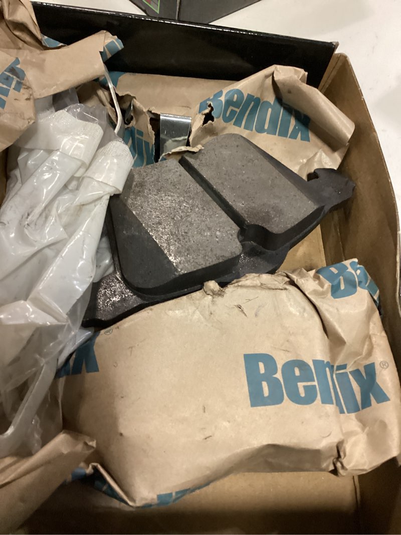 Condition photo showing As Is for bendix premium sbc1305 ceramic front brake pads for select models volvo s60, s60 cross country, s80, v40, v40 v60, v60 v70, v90 xc70