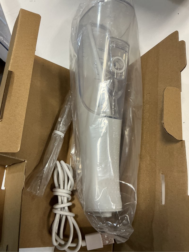 Condition photo showing As Is for Waterpik Cordless Pulse Rechargeable Portable Water Flosser for Teeth, Gums, Braces Care and Travel with 2 Flossing Tips, Waterproof for Shower, ADA Accepted, WF-20 White, Packaging and Tips May Vary