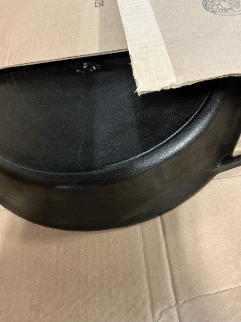 Condition photo showing As Is for lodge seasoned cast iron skillet - 17 inches - features 2 loop handles - pre-seasoned large frying pan with dual assist handles - large & versatile - durable iron frying pan | camping-cooking-utensils
