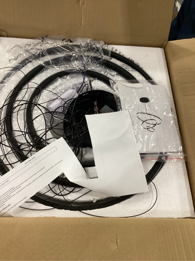 Condition photo showing As Is for Viruhaka Modern LED Pendant Light, Adjustable Height Circular Entrance Black 3 Ring Circular Chandelier Fixture, Suitable for Restaurants, Kitchens, Islands, Living Rooms, Cafes, Etc. (4000K) Black(20.27''W*70.86''H)