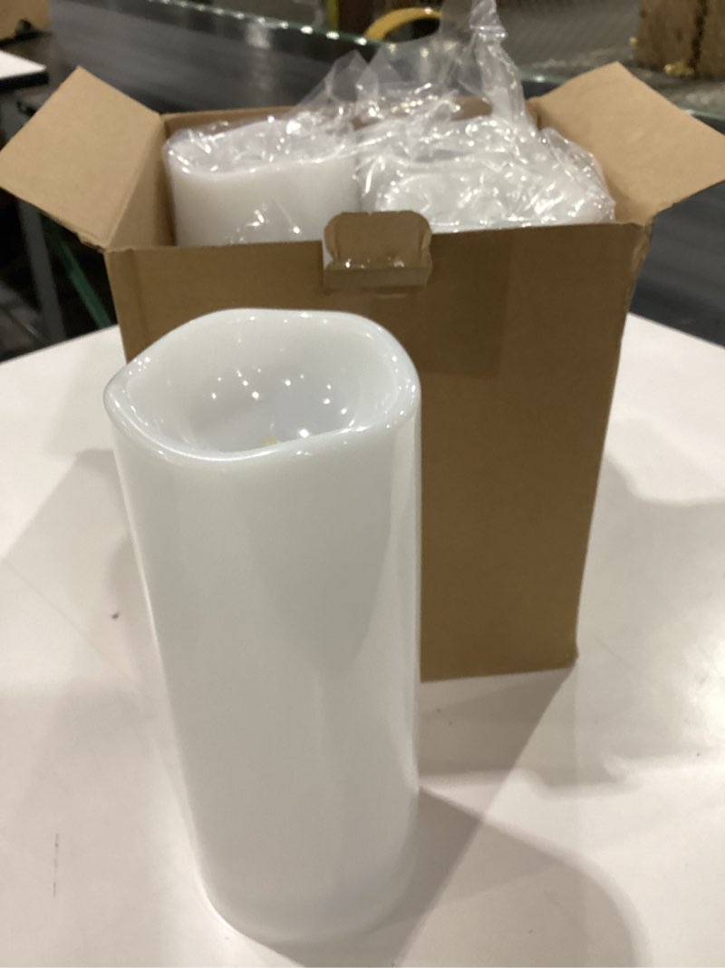 Condition photo showing New/Like New for Homemory 4"x10" Large Solar Candles Outdoor Waterproof, Dusk to Dawn, Solar Powered Flameless Candles for Outdoor, Lanterns, Set of 4 4"x10", 4 Pcs