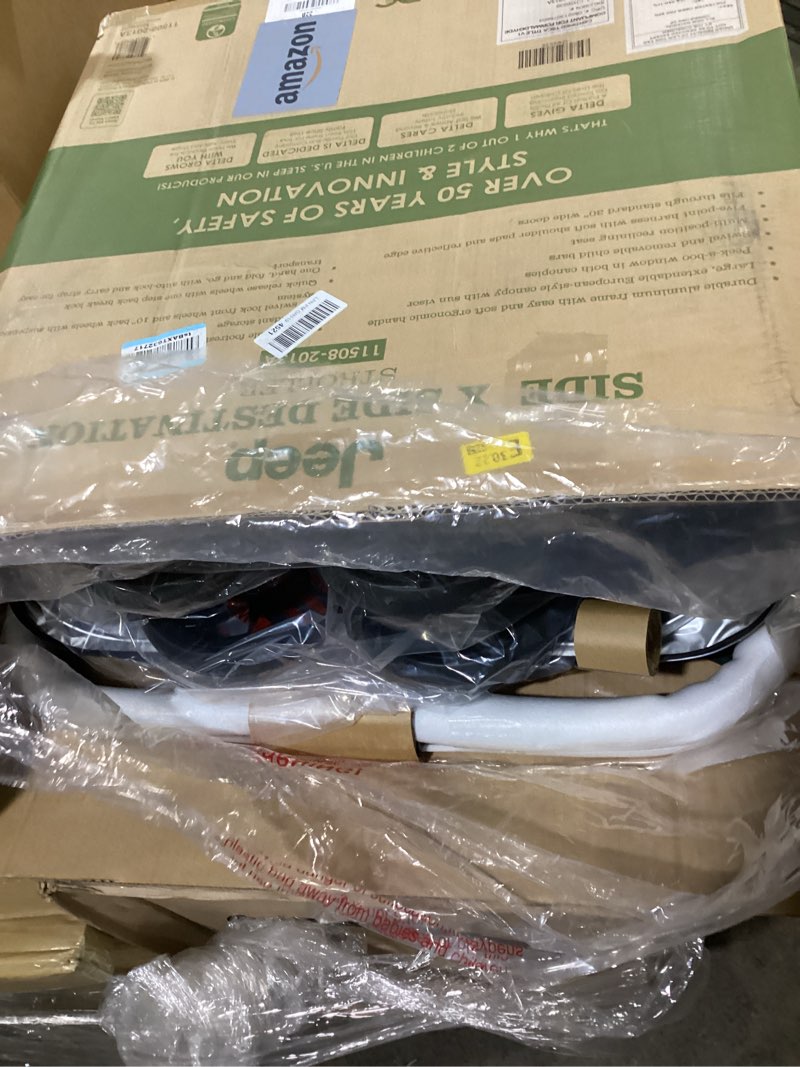 Condition photo showing New/Like New for jeep destination ultralight side x side double stroller, midnight