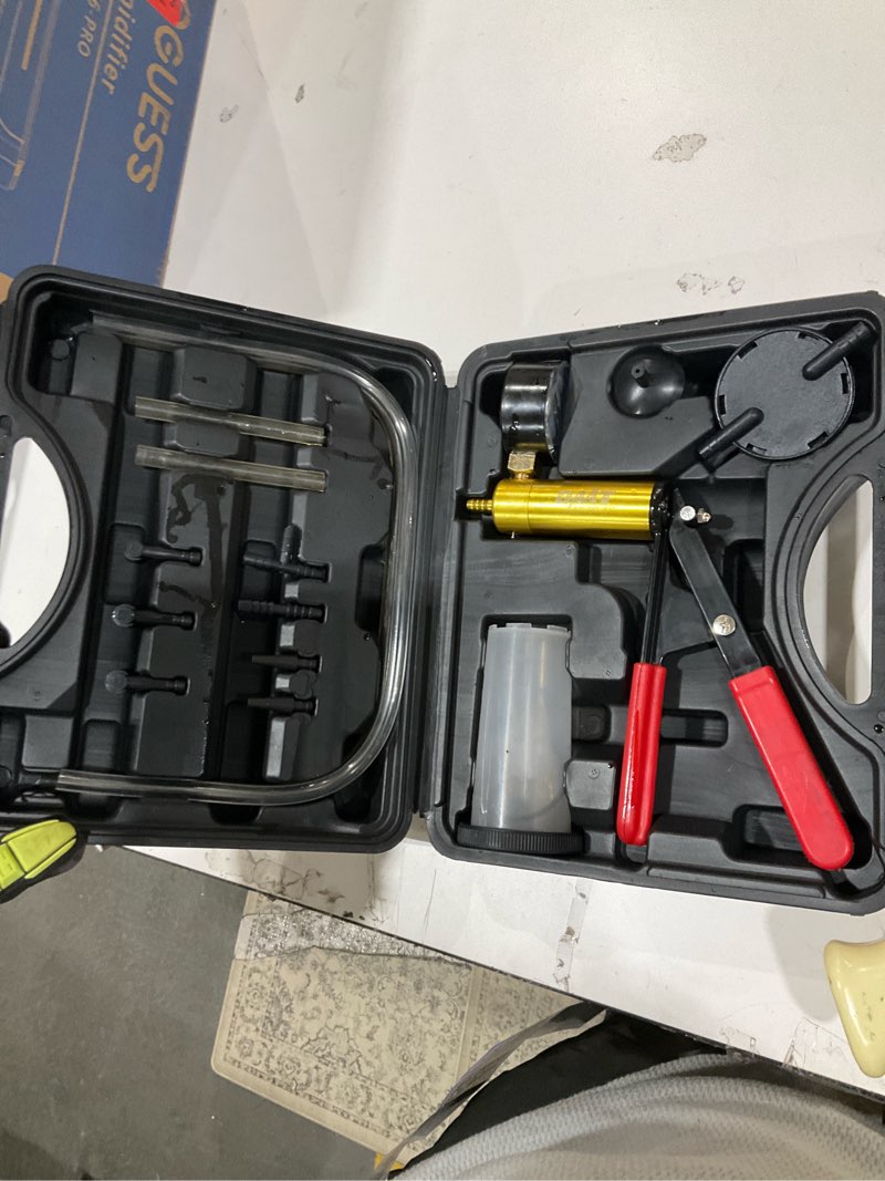 Condition photo showing As Is for break bleeder & vacuum kit