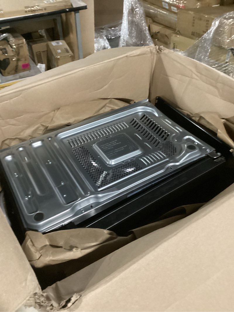 Condition photo showing Good Condition for toshiba air fryer combo 8-in-1 countertop microwave oven, with convection, broil, odor removal mode, 12.4" position memory turntable, child-lock, 1.0 cu.ft, black stainless steel, ml2-ec10sa(bs)