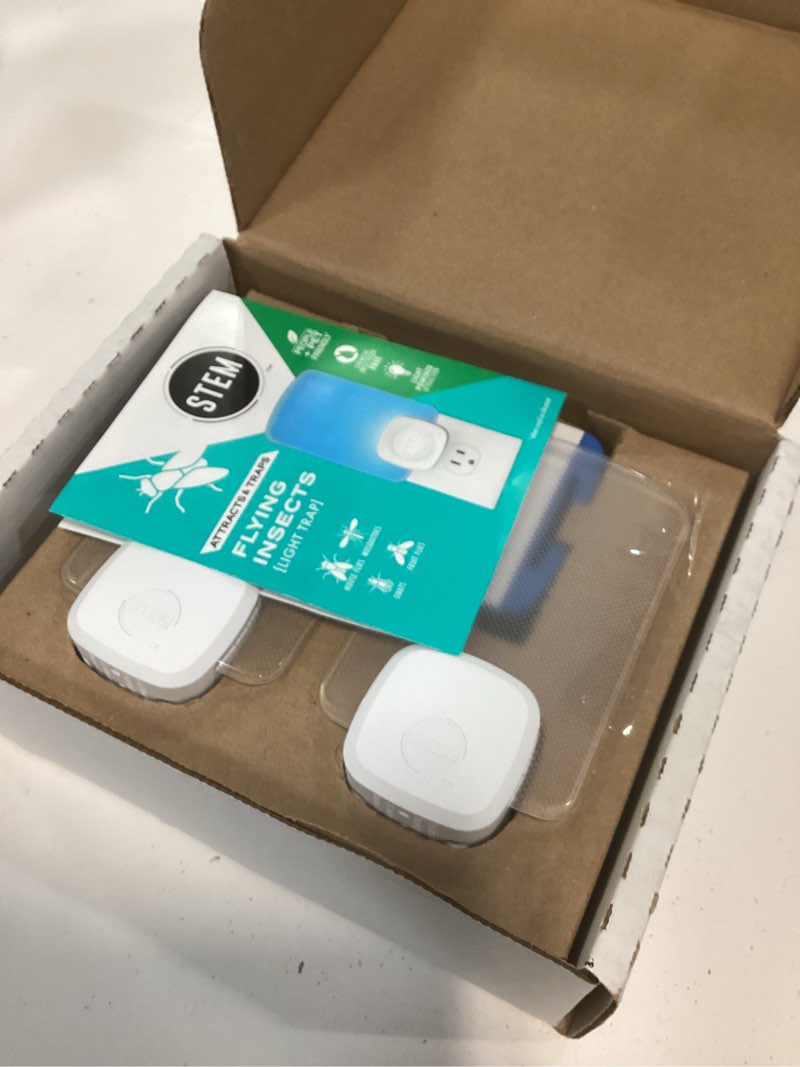 Condition photo showing New/Like New for stem flying insect trap - indoor fruit fly & gnat catcher for home, kitchen & any room, attracts & traps bugs, soft blue uv light - includes 2 plug-in devices & 2 cartridges