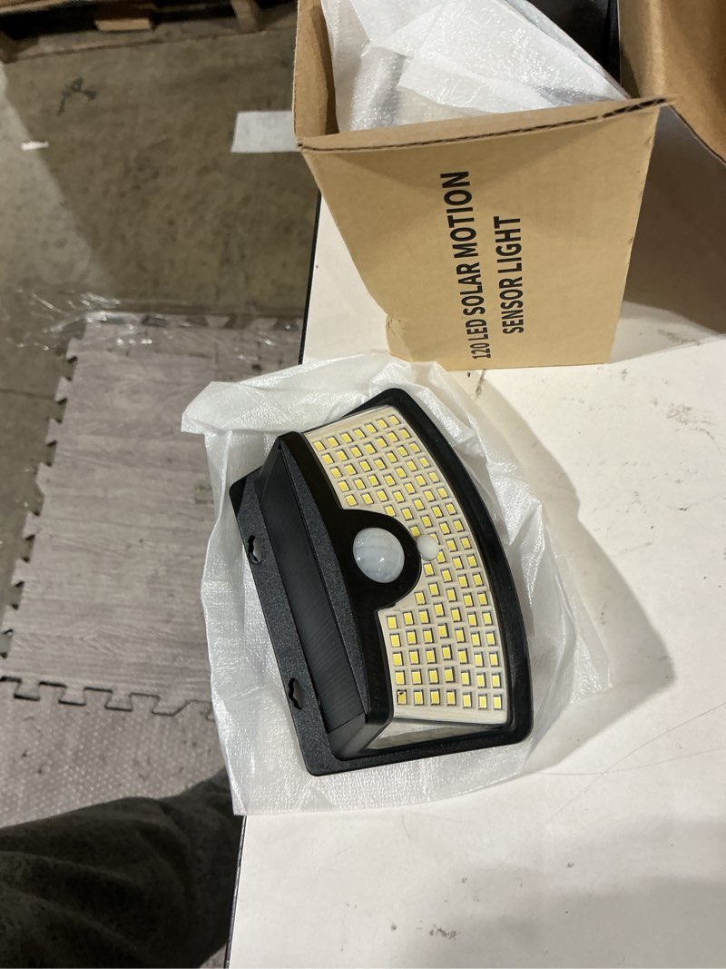 Condition photo showing Good Condition for aootek solar motion sensor lights outdoor 120 leds, black, 4 pack | lights reflector, 270° wide angle, ip65 waterproof, step lights for front door, yard, garage, deck black 4 pack